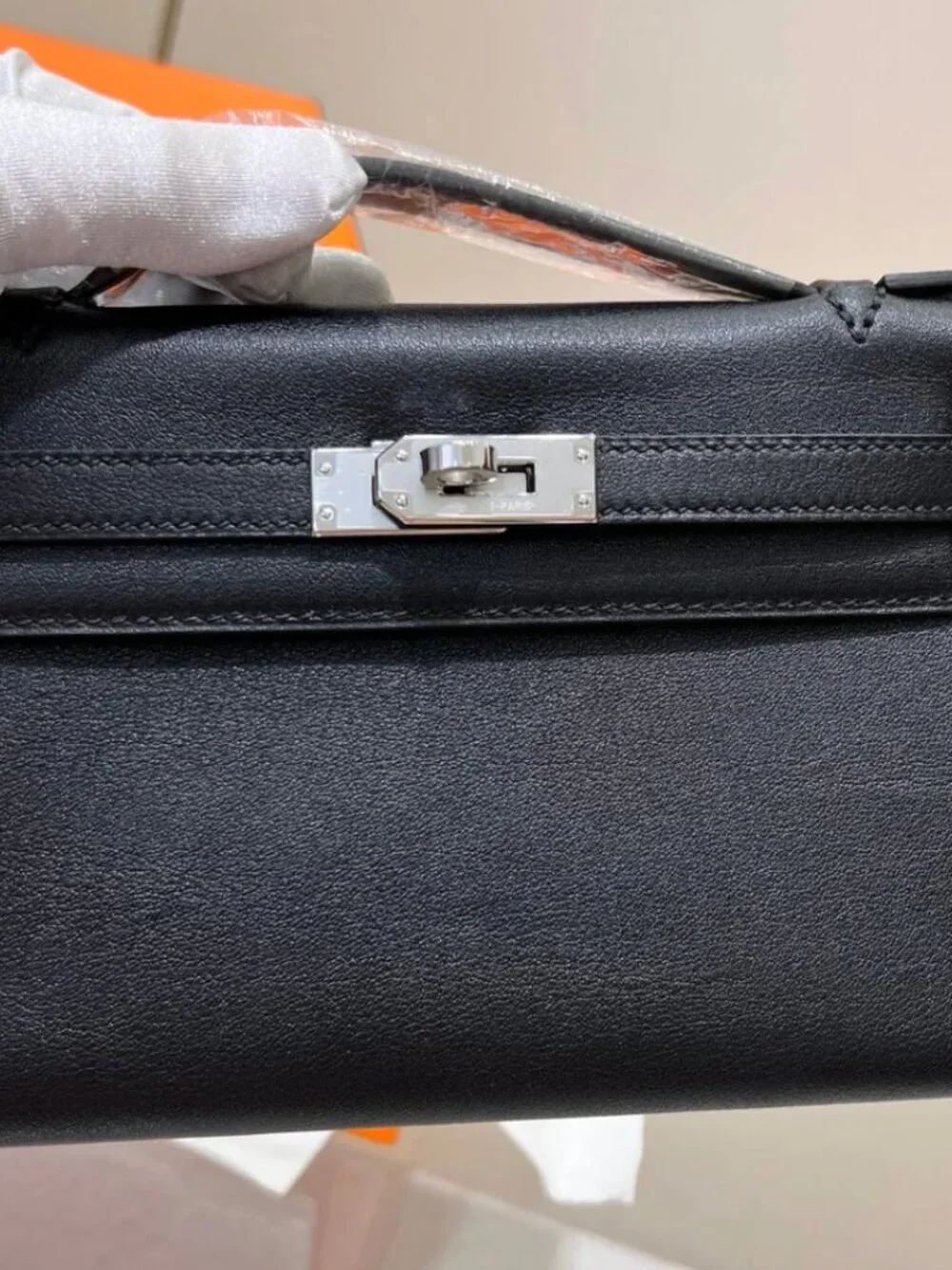 H Kelly pochette- swift, shw